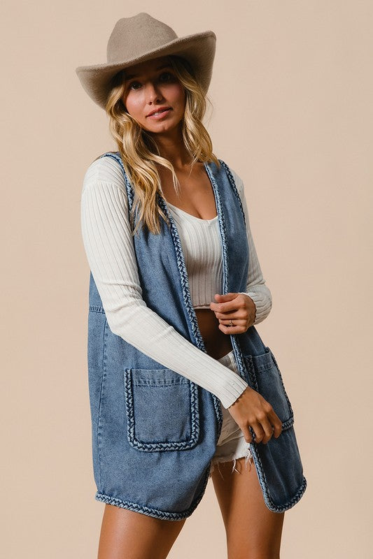 The Heirloom Braided Trim Open Front Denim Vest with Pockets